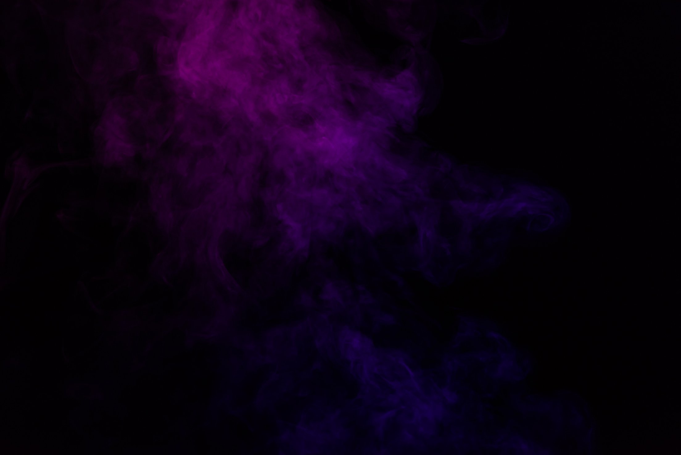 spiritual black background with purple smoke